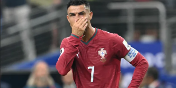 Portugal's forward #07 Cristiano Ronaldo reacts after losing the 2026 World Cup round of 16 football match between Portugal and Spain at the Dallas Stadium in Arlington on July 6, 2026