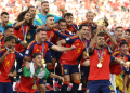 Spain's midfielder #16 Rodri lifts the trophy with his teammates after winning the 2026 World Cup football tournament final match between Spain and Argentina at the New York/New Jersey Stadium in East Rutherford on July 19, 2026