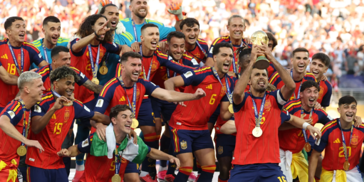 Spain's midfielder #16 Rodri lifts the trophy with his teammates after winning the 2026 World Cup football tournament final match between Spain and Argentina at the New York/New Jersey Stadium in East Rutherford on July 19, 2026