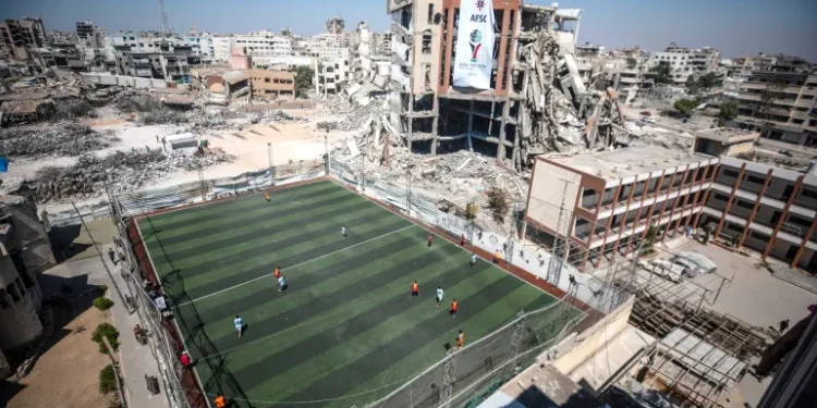 A football pitch amid the rubble in Gaza City