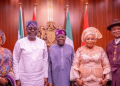 President Bola Ahmed Tinubu poses with the newly sworn-in Head of the Civil Service of the Federation, Abel Olumuyiwa Enitan, his wife, Olawunmi Ololade Enitan, and immediate past Head of Service Didi Esther Walson-Jack and her husband, Nimi Wilson-Jack, after the swearing-in ceremony at the State House in Abuja.