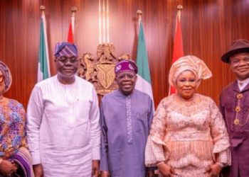 President Bola Ahmed Tinubu poses with the newly sworn-in Head of the Civil Service of the Federation, Abel Olumuyiwa Enitan, his wife, Olawunmi Ololade Enitan, and immediate past Head of Service Didi Esther Walson-Jack and her husband, Nimi Wilson-Jack, after the swearing-in ceremony at the State House in Abuja.