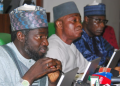 Members of the House of Representatives Ad Hoc Committee during a public hearing into the establishment and operations of the Presidential Foreign Intervention Promotion Council, PFIPC in Abuja.