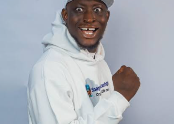 Nigerian streamer Carter Efe reacts during a livestream where he claims that the widely publicized wedding ceremony between TikTok personalities Peller and Jarvis is staged for content.