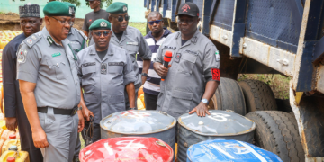 Nigeria Customs Service officers display seized items intercepted during anti-smuggling operations in Adamawa and Taraba states.