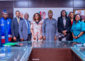 Dr Iziaq Salako with the technical working group