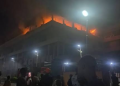 Image of the Federal Mortgage Bank of Nigeria headquarters in Abuja engulfed by flames before emergency responders were deployed to contain the fire and prevent further spread.