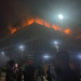 Image of the Federal Mortgage Bank of Nigeria headquarters in Abuja engulfed by flames before emergency responders were deployed to contain the fire and prevent further spread.