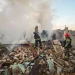Firefighters work at the site of a house destroyed during overnight Russian drone strikes in the town of Balakliya, in Kharkiv region, Ukraine, August 6, 2026