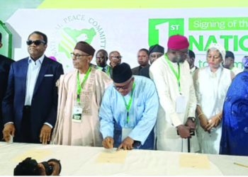 Presidential candidates and representatives of political parties sign a national peace accord ahead of the 2027 general elections in Abuja.