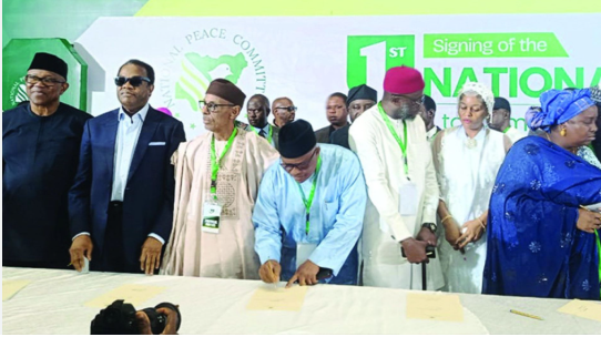 Presidential candidates and representatives of political parties sign a national peace accord ahead of the 2027 general elections in Abuja.