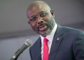 Former Liberian President George Weah addressing audience at the NBA conference