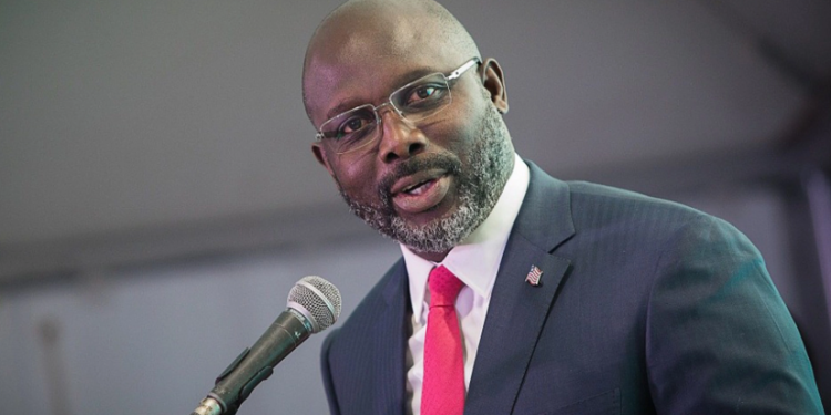 Former Liberian President George Weah addressing audience at the NBA conference