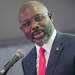 Former Liberian President George Weah addressing audience at the NBA conference