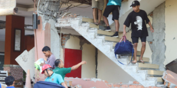 Residents in Flores seek food, water and shelter after a 7.7-magnitude earthquake leaves thousands displaced and awaiting emergency aid.