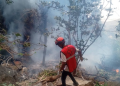 Kenya Red Cross emergency responders take part in a rescue and recovery operation at the scene of the helicopter crash that killed Ecuador’s intelligence chief Michele Sensi-Contugi, his wife and five others