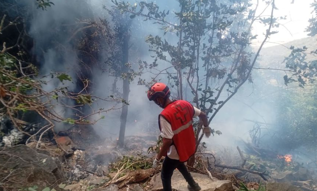 Kenya Red Cross emergency responders take part in a rescue and recovery operation at the scene of the helicopter crash that killed Ecuador’s intelligence chief Michele Sensi-Contugi, his wife and five others