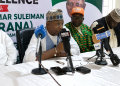 Officials and stakeholders at a press conference addressing journalists during the event