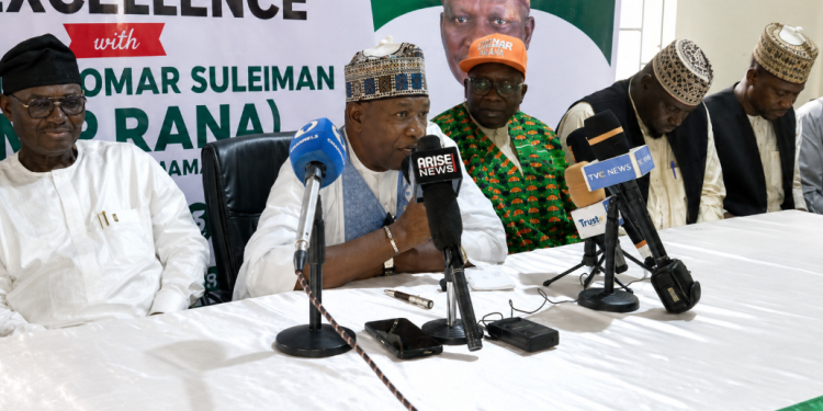 Officials and stakeholders at a press conference addressing journalists during the event