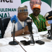 Officials and stakeholders at a press conference addressing journalists during the event