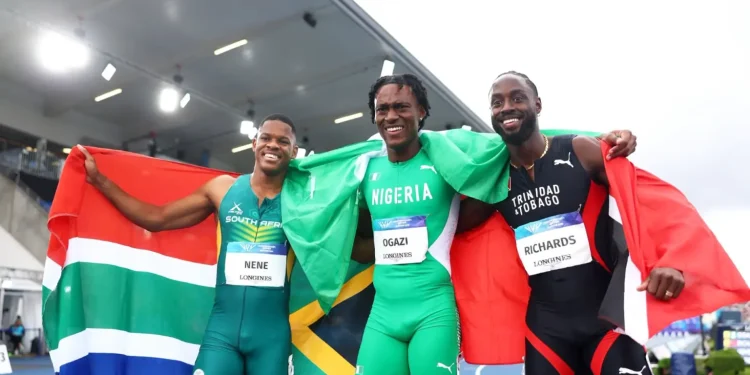 Nigeria's Samuel Ogazi (middle) celebrates after winning the 2026 Commonwealth Games 400 metres gold medal