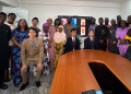 JICA officials, scholarship beneficiaries and other participants pose for a group photograph during a scholarship orientation and send-off ceremony in Abuja