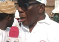 Senator Francis Fadahunsi speaks to supporters during a protest at the palace of the Owa Obokun of Ijesaland in Ilesa, Osun State, ahead of the state governorship election.