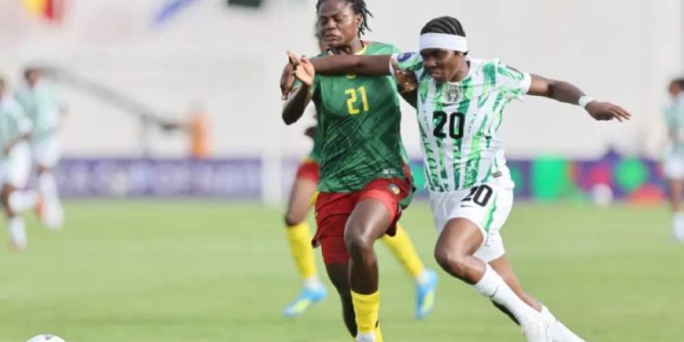 Indomitable Lionesses defender tackles a Super Falcons forward player
