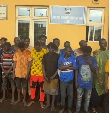 The suspects arrested over the alleged vandalism of the newly constructed Festac-Alakija Bridge in Lagos, paraded by security officials following a midnight enforcement operation.