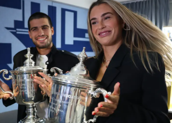 Tennis champions pose with their trophies as the US Open prepares to offer the biggest prize fund in Grand Slam history