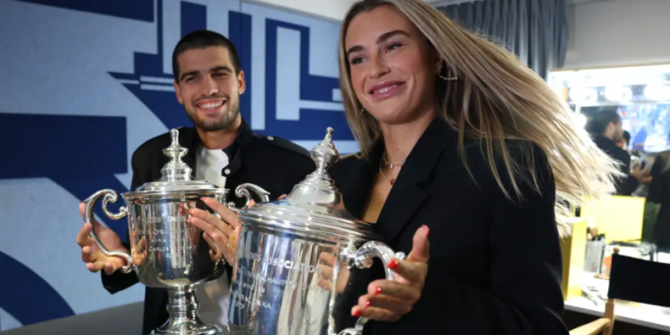 Tennis champions pose with their trophies as the US Open prepares to offer the biggest prize fund in Grand Slam history