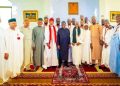 President Bola Tinubu poses with members of the Supreme Council of Tijaniyya Worldwide during their condolence visit to the State House in Abuja.