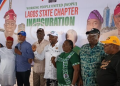 Workers and supporters of Working People United, WoPU, pose for a group photograph during the inauguration of the organization’s Lagos chapter in Ikeja.