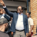 Presidential candidate Brian Muntayalwa Mundubile waves at supporters in Lusaka, Zambia