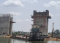 A view of the ongoing construction of the Buruku Bridge across the Katsina-Ala River in Benue State, which is expected to improve connectivity and provide safer passage for residents and commuters.