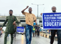 Students of Adekunle Ajasin University, Akungba-Akoko, block major roads around the institution during a protest against the 68-day strike disrupting academic activities and keeping students away from campus.