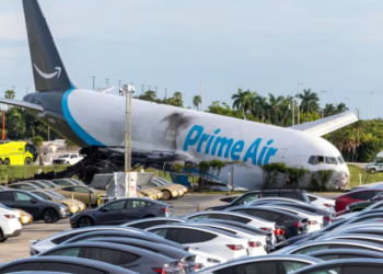 An Amazon Air cargo plane rests on its nose Sunday after overshooting the runway at Miami International Airport.