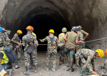 Army personnel have resorted to using explosives to blast into the hillside to reach the trapped workers