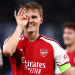 Arsenal's Martin Odegaard celebrates scoring their first goal