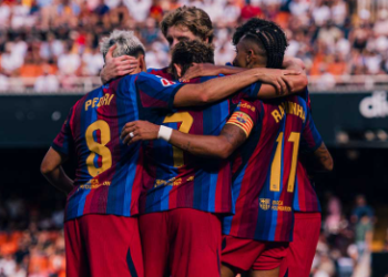 Barcelona players celebrate a goal