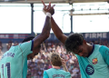 Barcelona's Lamine Yamal celebrates with Raphinha after scoring his side's second goal in the La Liga match against Levante
