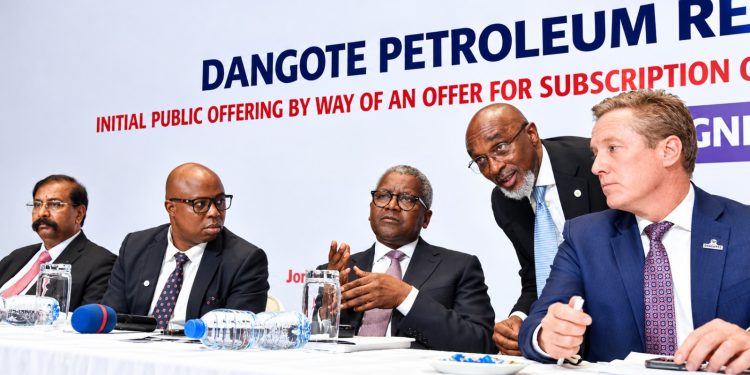 Aliko Dangote, President of Dangote Industries Limited, speaks during the formal launch of the Initial Public Offering of Dangote Petroleum Refinery and Petrochemicals at the Nigerian Exchange in Lagos.