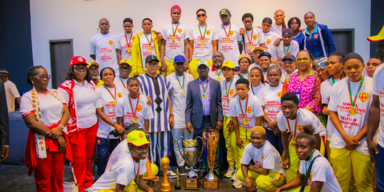 Edo State Governor Monday Okpebholo poses with members and officials of Edo Queens during a reception in Benin to celebrate the team’s NWFL and WAFU-B Champions League double triumph.