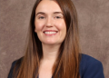 Bank of America vice president Erin Piacenti is killed in a stabbing attack in Times Square as police shoot the knife-wielding suspect.