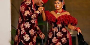 Evan Okoro and her husband, Erikife Fabian Chibuzor, during their traditional marriage ceremony.
