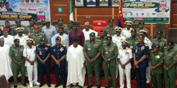 SGF George Akume joins Defence Headquarters and private-sector representatives at the launch of the AFN Personnel Online Discount Shop in Abuja.