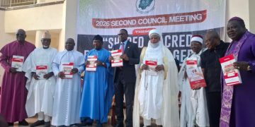 Sultan and others unveil the Interfaith Anti-Corruption Manuals designed to mobilize religious leaders in the fight against corruption.