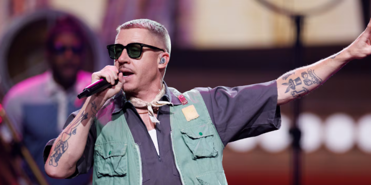 American rapper Macklemore announces a new 'Free Palestine' tour following his removal from Ed Sheeran’s Loop Tour over pro-Palestinian remarks made during a performance in New Jersey.