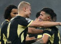 Manchester players celebrate goal