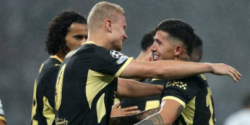 Manchester players celebrate goal